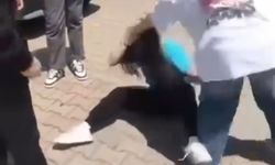 Lise öğrencisi, ortaokul öğrencisini saçlarından tutup yerde sürükledi