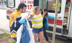 Otomobilden atılan kadın baygın bulundu