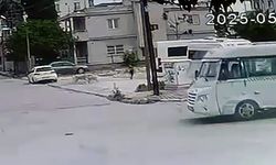 Sokak köpeklerinin saldırdığı çocuğu esnaf kurtardı