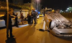 Alkollü sürücünün kullandığı otomobil park halindeki araca çarpıp takla attı