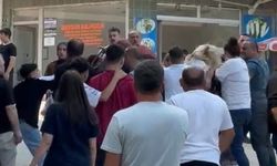 Boşanan çift ile yakınları arasındaki kavga kamerada