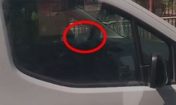 Bir ayağını cam kenarına koyup araç kullanan sürücüye ceza
