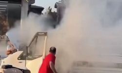 Çalkaladığı gazlı içecekle yangını söndürmeye çalıştı