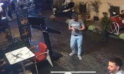 İstanbul - Taksim'de kapısının önüne park edilen motosiklete önce çorba döktü sonra tekme attı