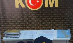 'PTT görevlisi' kıyafeti giyip dolandırıcılık yapan şüpheliye gözaltı