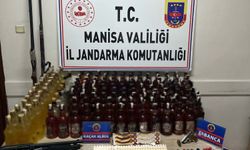 Evinde sahte içki ve ruhsatsız silahlarla yakalanan şüpheliye gözaltı