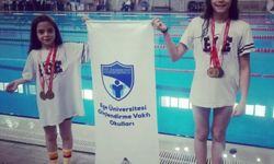 Antrenör babanın yüzücü kızları