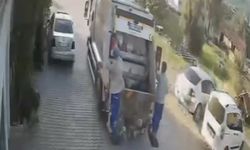 Çöp konteyneri çöp kamyonun peşinden sürüklendi; o anlar kamerada