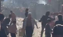 Adana'da iki grup arasındaki taşlı sopalı kavga kamerada