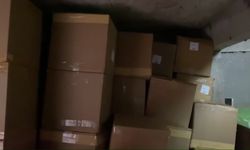 Depo olarak kullanılan ahırda 2 ton kaçak tütün ve 372 bin makaron ele geçirildi