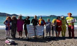 Muğla'da yardıma muhtaç çocuklar ve hayvanlara destek için denize girdiler