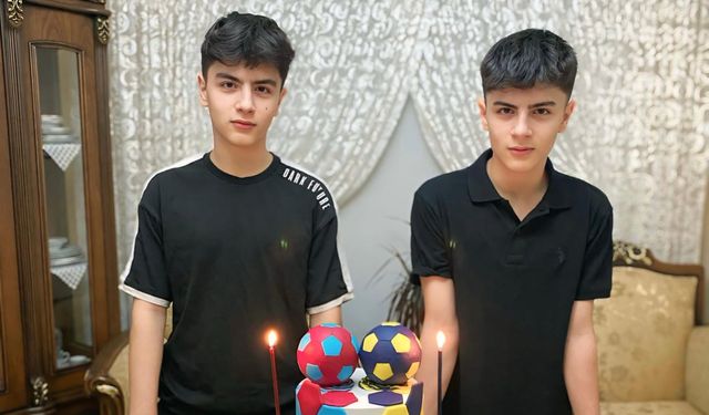 İkizlerin pastası iki ayrı takım rengiyle süslendi