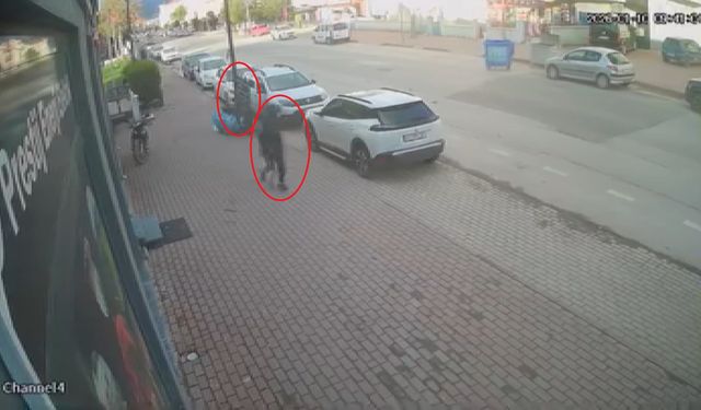 Fırtınada düşen tabelanın altında kalmaktan son anda kurtuldu